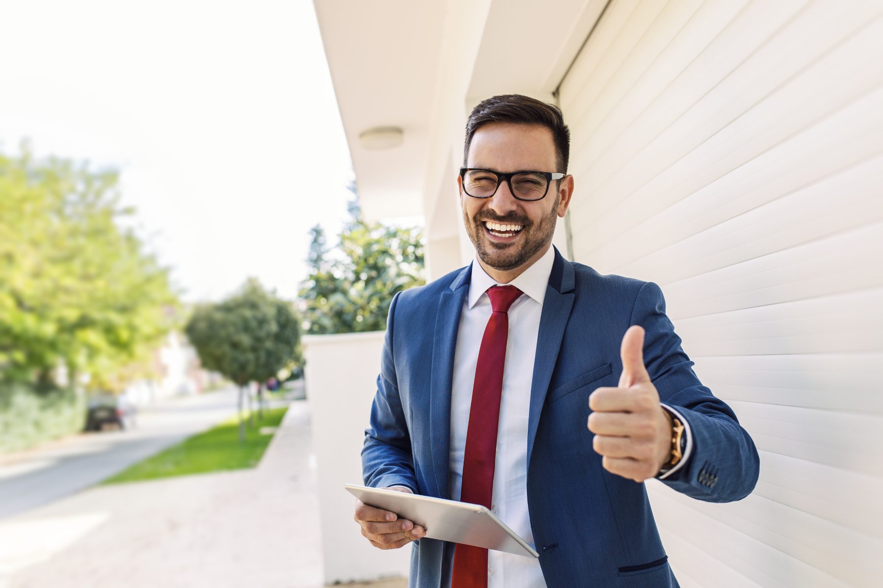 Real estate agent giving a thumbs up